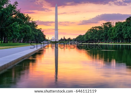 Washington Monument and Capitol Building from the Reflecting Pool in Washingon DC, USA.
