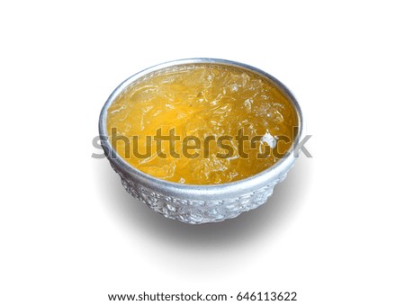 Glass of cold chrysanthemum tea isolated on white background with clipping path.