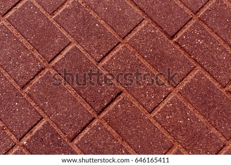 Red toned pavement surface. Abstract background and texture for design.