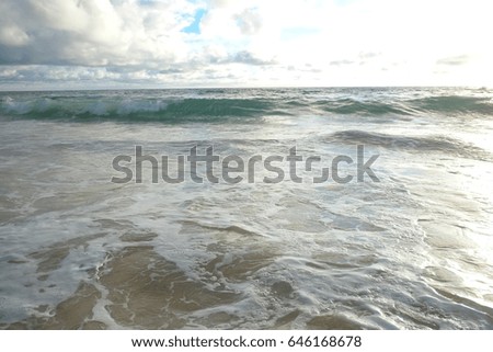 Beach, sand and blue sea water.