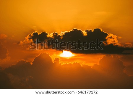 Yellow and orange twilight sky in the evening of sunset time. Picture for sky scape background.