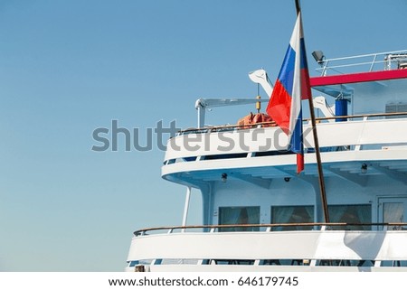 Russia flag on the stern of the passenger ship