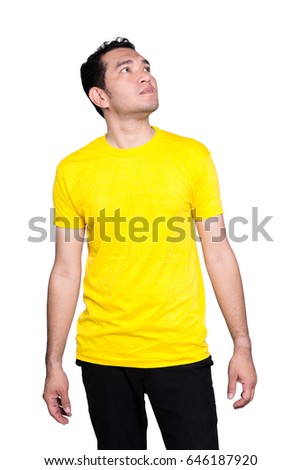 A standing young man looking up at the sky isolated on white background.