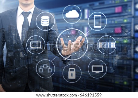 Double exposure of professional businessman connecting network and devices on hand in Cloud technology, communication and business concept