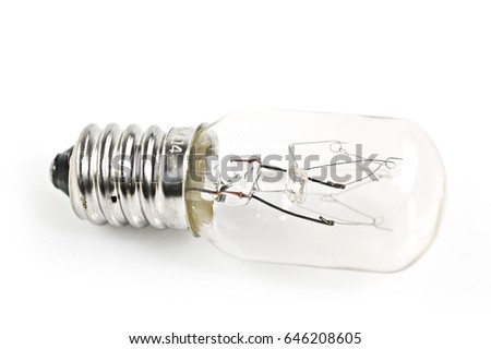 A modern lightbulb beautifully transparent as it's isolated against a white background.