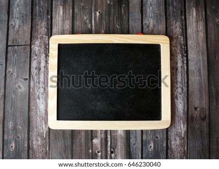 Chalkboard on a wooden background