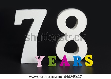 Letters and numbers-seventy eight on a black isolated background.