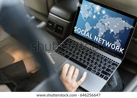 Hands working on laptop network graphic
