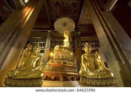 Golden Buddha at Church in temple , Phetburi city , Middle of Thailand.