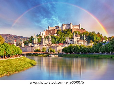Austria, Rainbow over Salzburg castle Royalty-Free Stock Photo #646300075