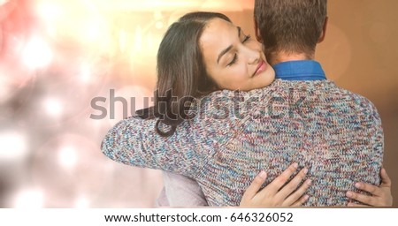 Digital composite of Loving woman embracing man