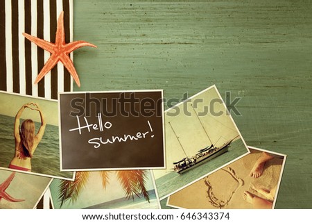 Vacation photos in retro photo frames over wooden background.Summer Vacation Concept.