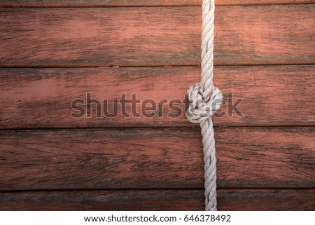 Wooden wall with rope