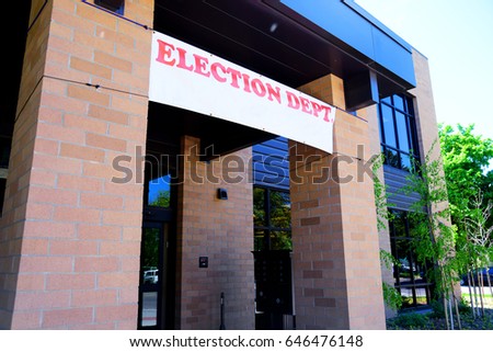 Banner hangs above the doorway of a Election Department