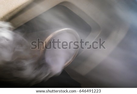 Exhaust gases come from the exhaust system of a diesel engine Royalty-Free Stock Photo #646491223