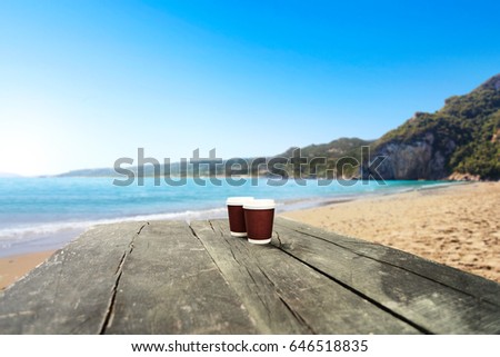 wooden  desk space and summer beach