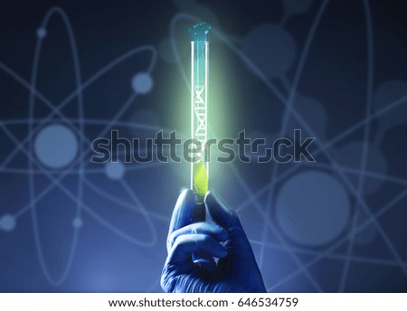 Scientific concept. Laboratory worker holding test tube with liquid on color background