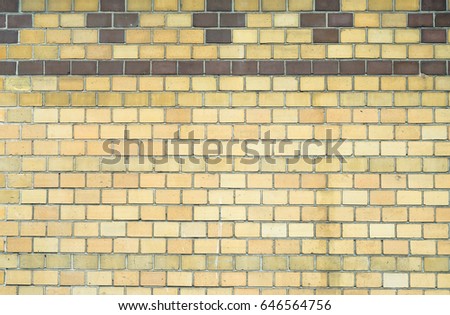 Yellow brick wall of an ancient building