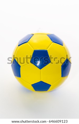Soccer ball yellow-blue on a white background isolated