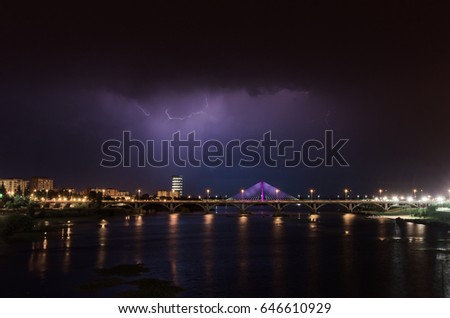 Lightning storm over Badajoz city in night