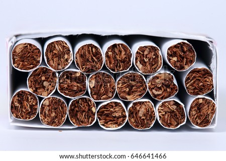 Close-up of Tobacco Cigarettes Background or texture.Concept World No Tobacco Day.