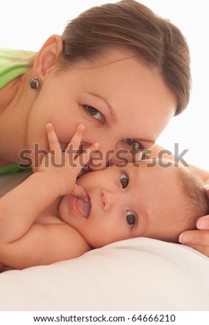baby with her mother on the white background