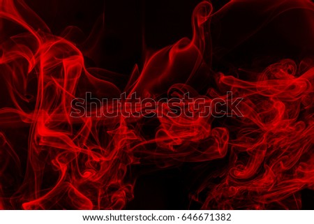 Abstract colorful smoke on black background Royalty-Free Stock Photo #646671382
