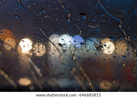 raindrops on car glass in the raining day, rain stain