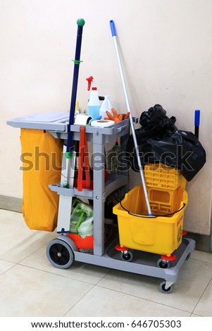 Yellow mop bucket and set of cleaning equipment in the airport. Donmuang international Airport ,Thailand