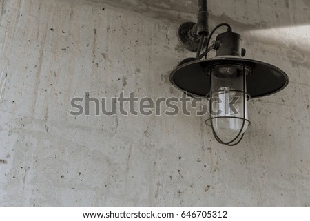 industrial street light decoration. white wall lighting vintage retro style in black and white with space for text.