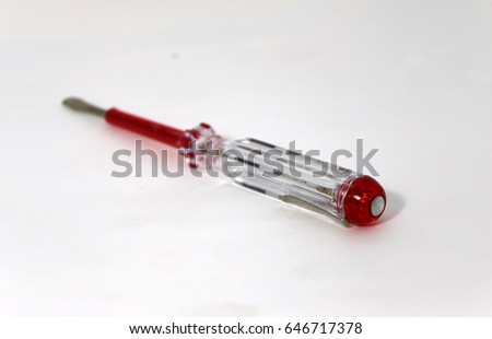 Measuring the power screwdriver on white Background. Use to check electricity for safety in work.