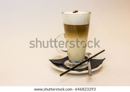 Cappuccino or latte coffee on white background with copy space. Good morning concept. retro vintage style