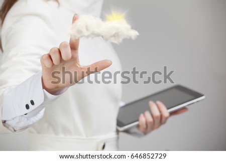 Woman with cloud and sun. Concept on the topic of computer cloud services.