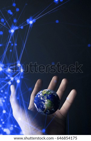 globe network in my hand Elements of this image furnished by NASA