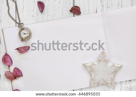 Stock Photography Stock Photography flat lay vintage white painted wood table purple flower petals pocket clock star craft
