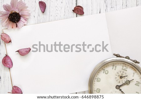 Stock Photography Stock Photography flat lay vintage white painted wood table purple flower petals vintage alarm clock