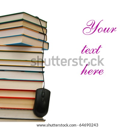 A computer mouse on textbook pile