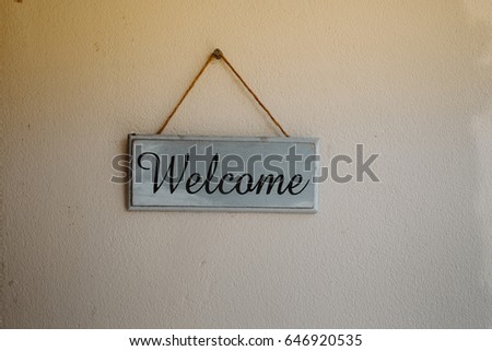 Welcome sign on the wall 