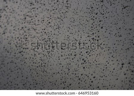 Drops of water on the car window color, nature background