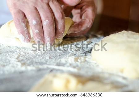 old woman's hand monthly dough