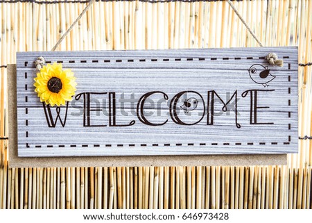 Welcome sign hanging
