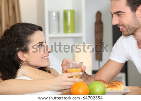 Loving couple at breakfast
