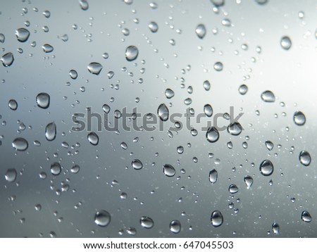 rain drops on te window on rainy day