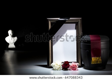 black cemetery urn with blank mourning frame and Lenin statue for Communist funeral on dtrk background
