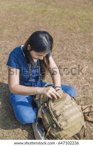 Women are holding bags for hiking
