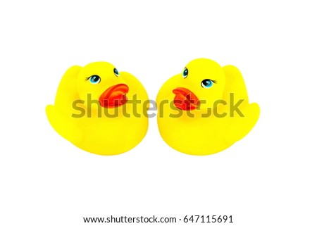  Mock of duck, Two yellow rubber duck toys on white background.