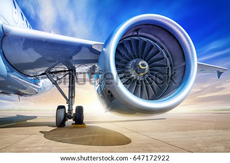 jet engine against a sunset Royalty-Free Stock Photo #647172922