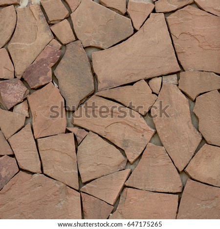 Brick texture background. Stone wall texture, natural background material, stone in the interior, decor ideas. Brick wall in the interior