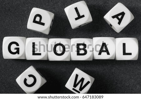 word global on white toy cubes