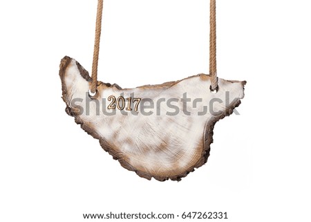 2017 new year,Wooden board on ropes on white isolated background